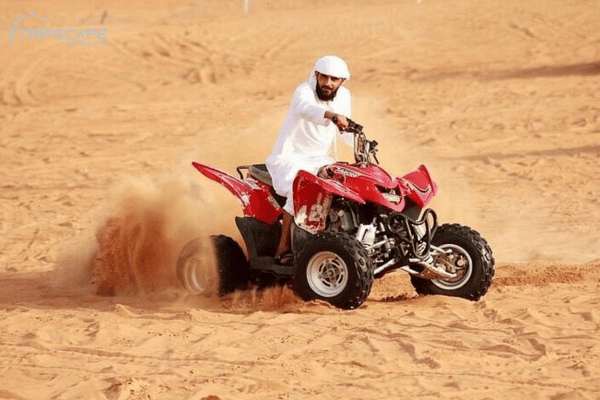 desert safari with quad bike - dubaiguidetours.com